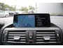 BMW 1-Serie 116i High Executive M-Sport Clima/Cruise/Stoelverwarming/Xenon/PDC/LederSportstoelen/Navi/Bluetooth/RadioAUX.USB/17"LM
