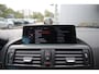 BMW 1-Serie 116i High Executive M-Sport Clima/Cruise/Stoelverwarming/Xenon/PDC/LederSportstoelen/Navi/Bluetooth/RadioAUX.USB/17"LM