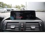 BMW 1-Serie 116i High Executive M-Sport Clima/Cruise/Stoelverwarming/Xenon/PDC/LederSportstoelen/Navi/Bluetooth/RadioAUX.USB/17"LM