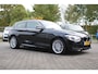 BMW 1-Serie 116i High Executive M-Sport Clima/Cruise/Stoelverwarming/Xenon/PDC/LederSportstoelen/Navi/Bluetooth/RadioAUX.USB/17"LM