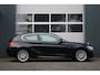 BMW 1-Serie 116i High Executive M-Sport Clima/Cruise/Stoelverwarming/Xenon/PDC/LederSportstoelen/Navi/Bluetooth/RadioAUX.USB/17"LM