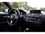 BMW 1-Serie 116i High Executive M-Sport Clima/Cruise/Stoelverwarming/Xenon/PDC/LederSportstoelen/Navi/Bluetooth/RadioAUX.USB/17"LM