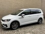 Volkswagen Touran 1.2 TSI 110pk Highline Business R-line 7-persoons | Trekhaak | Navigatie | Camera | Elektrische achterklep | Apple CarPlay | Climate control | Adaptieve cruise | Stoelverwarming | Volledig onderhouden