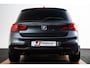 BMW 1-Serie M140i xDrive High Executive Harman Kardon - Elektrisch verwarmde voorstoelen - Sportstoelen - Cruise Control - Achteruitrijcamera - PDC Voor/Achter - Middenarmsteun voor - Adaptieve LED koplampen -