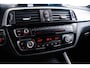 BMW 1-Serie M140i xDrive High Executive Harman Kardon - Elektrisch verwarmde voorstoelen - Sportstoelen - Cruise Control - Achteruitrijcamera - PDC Voor/Achter - Middenarmsteun voor - Adaptieve LED koplampen -