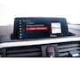 BMW 1-Serie M140i xDrive High Executive Harman Kardon - Elektrisch verwarmde voorstoelen - Sportstoelen - Cruise Control - Achteruitrijcamera - PDC Voor/Achter - Middenarmsteun voor - Adaptieve LED koplampen -