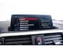 BMW 1-Serie M140i xDrive High Executive Harman Kardon - Elektrisch verwarmde voorstoelen - Sportstoelen - Cruise Control - Achteruitrijcamera - PDC Voor/Achter - Middenarmsteun voor - Adaptieve LED koplampen -