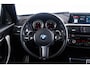 BMW 1-Serie M140i xDrive High Executive Harman Kardon - Elektrisch verwarmde voorstoelen - Sportstoelen - Cruise Control - Achteruitrijcamera - PDC Voor/Achter - Middenarmsteun voor - Adaptieve LED koplampen -