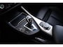 BMW 1-Serie M140i xDrive High Executive Harman Kardon - Elektrisch verwarmde voorstoelen - Sportstoelen - Cruise Control - Achteruitrijcamera - PDC Voor/Achter - Middenarmsteun voor - Adaptieve LED koplampen -