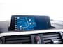 BMW 1-Serie M140i xDrive High Executive Harman Kardon - Elektrisch verwarmde voorstoelen - Sportstoelen - Cruise Control - Achteruitrijcamera - PDC Voor/Achter - Middenarmsteun voor - Adaptieve LED koplampen -