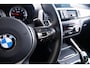 BMW 1-Serie M140i xDrive High Executive Harman Kardon - Elektrisch verwarmde voorstoelen - Sportstoelen - Cruise Control - Achteruitrijcamera - PDC Voor/Achter - Middenarmsteun voor - Adaptieve LED koplampen -