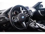 BMW 1-Serie M140i xDrive High Executive Harman Kardon - Elektrisch verwarmde voorstoelen - Sportstoelen - Cruise Control - Achteruitrijcamera - PDC Voor/Achter - Middenarmsteun voor - Adaptieve LED koplampen -