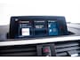BMW 1-Serie M140i xDrive High Executive Harman Kardon - Elektrisch verwarmde voorstoelen - Sportstoelen - Cruise Control - Achteruitrijcamera - PDC Voor/Achter - Middenarmsteun voor - Adaptieve LED koplampen -
