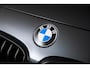 BMW 1-Serie M140i xDrive High Executive Harman Kardon - Elektrisch verwarmde voorstoelen - Sportstoelen - Cruise Control - Achteruitrijcamera - PDC Voor/Achter - Middenarmsteun voor - Adaptieve LED koplampen -