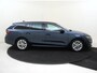 Skoda Octavia Combi 1.0 e-TSI Business Edition | Trekhaak | Head-up display | Keyless | Achteruitrijcamera | Navigatie | Stoelverwarming | Dodehoek detectie | Cruise control |
