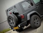 Jeep Wrangler 3.8i Sport Automaat | XRC Bumpers | Mopar Zijschermen | Rollcage | LED | Afneembaar Dak | Custom Uitlaat | Apple Carplay | 4-Zits | Offroadbanden | Hardtop