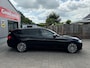 BMW 5-Serie Touring 520i High Executive Alles zwart!