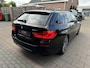 BMW 5-Serie Touring 520i High Executive Alles zwart!