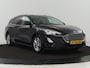 Ford Focus Wagon 1.5 EcoBoost Titanium Business | Stoel & Stuurverwarming | LED | Cruise Control | Trekhaak | Camera | Navigatie | Carplay