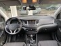 Hyundai Tucson 1.6 GDi Comfort Navigatie/Achteruitr.camera/Cruisecontrole/Verw. voorstoelen /Autom. Airco/Parkeersens. V+A/Elektr. inkl.bare verw. buitenspiegels/Multifunct. Stuur/Mistlampen Voor/Dakrails/Leder versn.pook