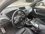 BMW 1-Serie 118i M Sport / Leder / Navigatie / Parkeerhulp achter / 18'' / Stoelverwarming / Cruise Control