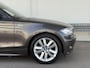 BMW 1-Serie 118i High Executive|88Dkm NAP!|Xenon|Ketting Verv.|Cruise|HiFi|Uniek