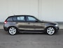 BMW 1-Serie 118i High Executive|88Dkm NAP!|Xenon|Ketting Verv.|Cruise|HiFi|Uniek