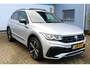 Volkswagen Tiguan 1.4 TSI eHybrid R-Line Business 245 pk | Incl. 12 maanden Garantie | Panorama dak | Stoel/stuurverwarming | 360* Camera | Elektrisch verstelbare stoelen met memory | Achterbank verwarmd | Keyless enry/start | Adaptieve cruise | Lane assist | IQ.Lights | Dodehoekdetectie | Elektrische kofferbakklep | Draadloze telefoonlader | Sfeerverlichting | Apple CarPlay/Android auto | Climate controle | Navigatie | 20 Inch LMV |