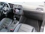 Volkswagen Tiguan 1.4 TSI eHybrid R-Line Business 245 pk | Incl. 12 maanden Garantie | Panorama dak | Stoel/stuurverwarming | 360* Camera | Elektrisch verstelbare stoelen met memory | Achterbank verwarmd | Keyless enry/start | Adaptieve cruise | Lane assist | IQ.Lights | Dodehoekdetectie | Elektrische kofferbakklep | Draadloze telefoonlader | Sfeerverlichting | Apple CarPlay/Android auto | Climate controle | Navigatie | 20 Inch LMV |