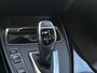 BMW 1-Serie M140i Edition Shadow High Executive ✅ Remus uitlaatsysteem ✅ Harman Kardon ✅ Rijklaar ✅