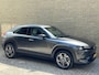 Mazda MX-30 e-SkyActiv 145 Luxury 36 kWh | Adaptieve cruise | Navigatie | Head up | Apple CarPlay | Camera | Dodehoekdetectie | Stof/lederen bekleding | PDC | LED | DAB | Stoel&stuurverwarming | Volledig dealeronderhouden