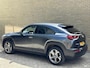 Mazda MX-30 e-SkyActiv 145 Luxury 36 kWh | Adaptieve cruise | Navigatie | Head up | Apple CarPlay | Camera | Dodehoekdetectie | Stof/lederen bekleding | PDC | LED | DAB | Stoel&stuurverwarming | Volledig dealeronderhouden