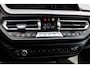 BMW 1-Serie M135i xDrive High Executive PANO HUD CAMERA LEER