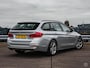BMW 3-Serie Touring 320d EDE High Executive Panoramadak Leder LED Trekhaak
