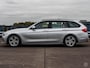 BMW 3-Serie Touring 320d EDE High Executive Panoramadak Leder LED Trekhaak