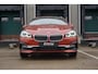 BMW 2-Serie Active Tourer 218i 140pk AUT High Executive Launch Edition | Trekhaak | Panoramadak | Stoelverwarming | Achteruitrijcamera