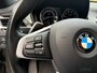 BMW X1 sDrive20i 192pk High Exe,Pano,LED,Sportleer,HUD,NaviPro,Stoelverw,Clima,Cruise,Camera
