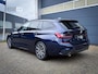 BMW 3-Serie Touring 330e xDrive M-Sport | Laser Pano HUD Leder Stuurverwarming