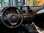 BMW 1-Serie 116i High Executive Garantie Pano StoelVW Cruise Navi Clima PDC Rijklaar