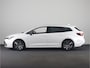 Toyota Corolla Touring Sports Hybrid 180 Business Plus | Parkeersensoren V+A | Half lederen bekleding | Parelmoer lak | Stoelverwarming | *