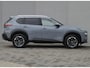 Nissan X-Trail 1.5 e-Power Tekna Automaat / HUD / Glazen schuif- en kanteldak / Elektrische achterklep / Stuur-, Stoel en Achterbank verwarming / Rondomzicht camera / Adaptief CC / Apple Carplay Android Auto / Voorruit verwarming /
