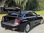 BMW 3-Serie 320e BUSINESS+ EDITION LEDER/CAMERA/TREKHAAK