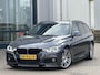 BMW 3-Serie Touring 320i High Executive M-Pakket | NL-Auto/NAP/Leder/Sportstoel/Carplay/Navi/19-inch