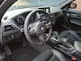 BMW 1-Serie 120i Sport Line 184PK Panoramadak / Apple Carplay / Harman Kardon / Navigatie / Trekhaak / Led Verlichting / Stoelverw