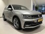 Volkswagen Tiguan 1.5 TSI Comfortline Business 131 PK | R-Line Exterieur | Apple Carplay | Digital Cockpit Pro | Parkeersensoren | Adaptive Cruise Control | Rijstrookhulp | Driving Modes | Navigatie | Climate Control | Bluetooth |
