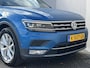 Volkswagen Tiguan 1.4 TSI ACT Highline / Inklapbare Trekhaak (Trekgewicht 1.800kg) / Elektrisch Glazen Schuif- en Kanteldak / 360º Camera / Apple Carplay & Android Auto / Adaptieve Cruise Control / Climate Control / Navigatie full map / Elektrisch Verstelbare Bestuurdersstoel met geheugenset / Keyless Entry & Start / Elektrische Achterklep / Verwarmde Voorstoelen /