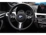 BMW X1 sDrive18i High Exe. M Sport / Trekhaak / Half leder / Navi. Proff / Parkeerhulp V+a / 18'' / Stoelverwarming / DAB / Cruise Control