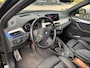BMW X1 sDrive18i High Exe. M Sport / Trekhaak / Half leder / Navi. Proff / Parkeerhulp V+a / 18'' / Stoelverwarming / DAB / Cruise Control