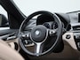 BMW X1 sDrive20i Orange Edition III | PANO-SCHUIFDAK | HEAD-UP | LEER | CAMERA | STOELVERWARMING | SPORTSTOELEN