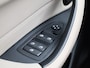 BMW X1 sDrive20i Orange Edition III | PANO-SCHUIFDAK | HEAD-UP | LEER | CAMERA | STOELVERWARMING | SPORTSTOELEN